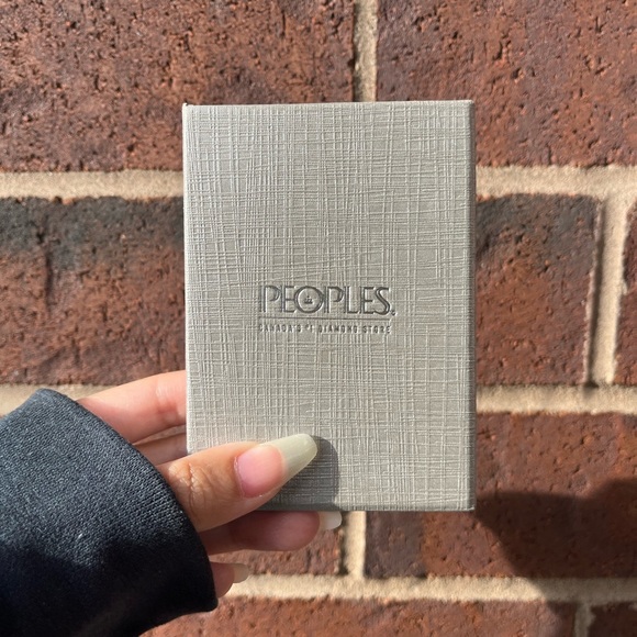 0.04 CT. T.W. Diamond Interlocking Hearts Bracelet in Sterling Silver - 6.75" - Picture 10 of 10